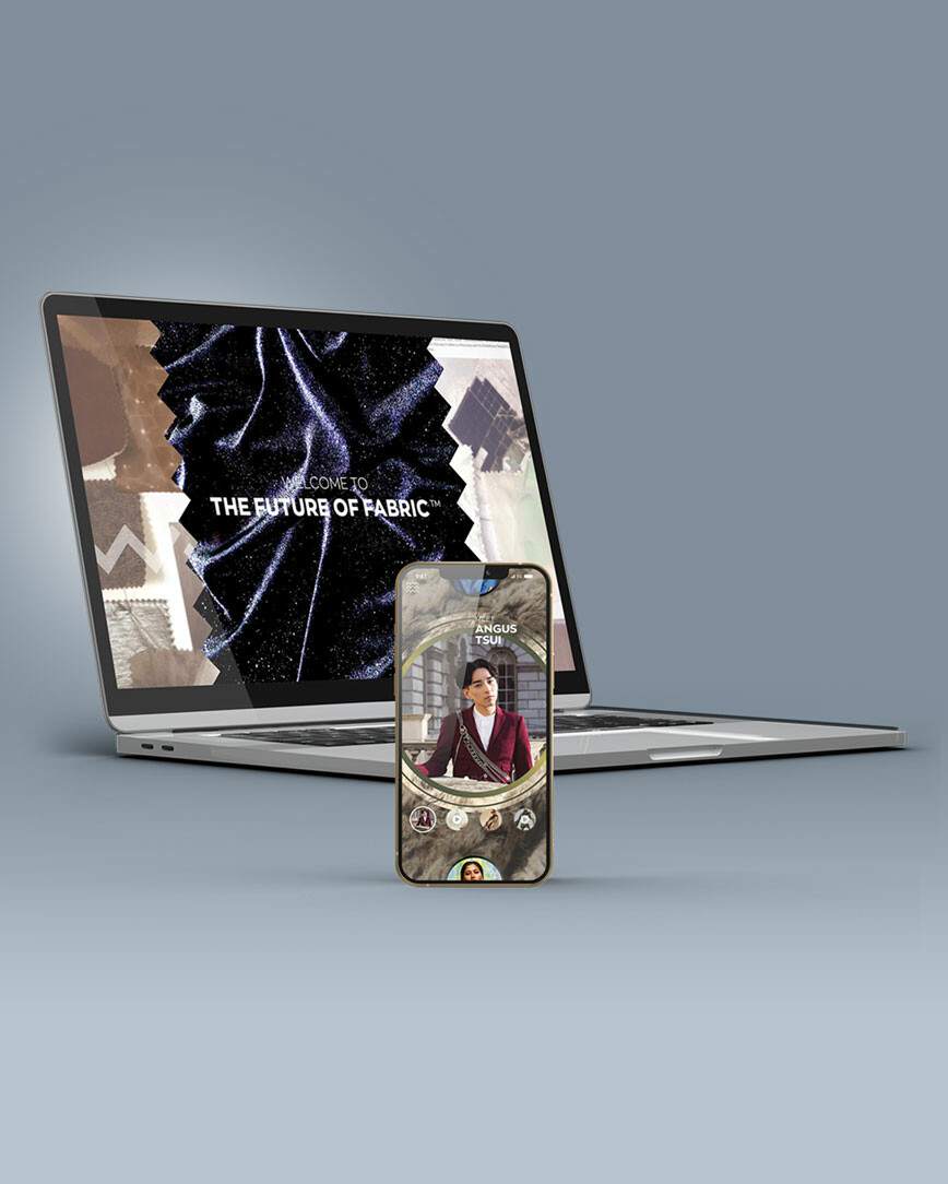 An image of a laptop and mobile device with the Future of Fabric website design created by Vs.